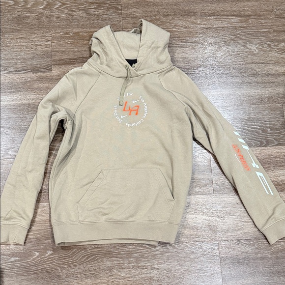 Nike Tops - Nike Tan Hoodie with Graphic Print